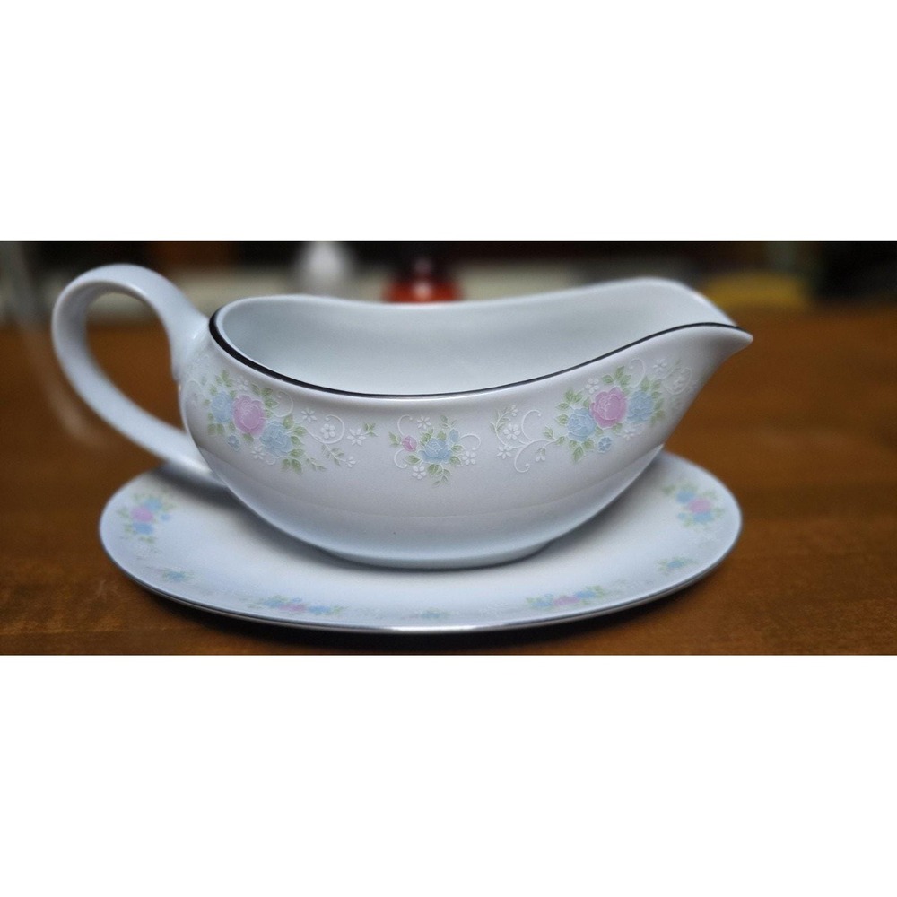 Prestige China Garden gravy boat matching plate, floral design and silver trim.
